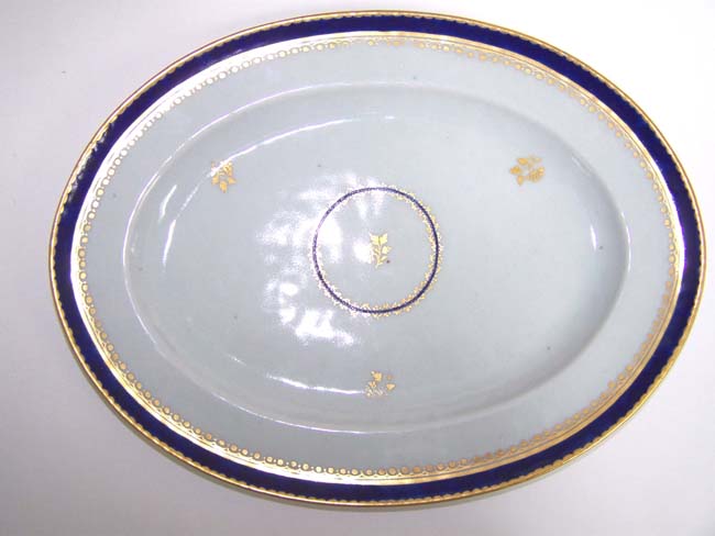 A late 18th century Chinese Export Armorial blue and white serving dish with gilt decoration circa 1785.